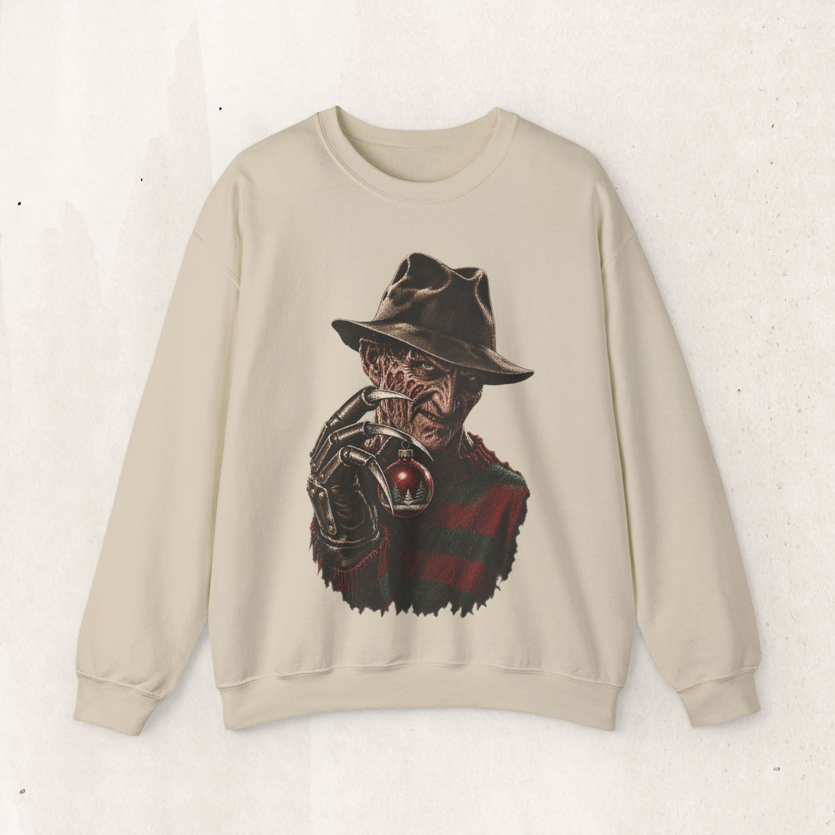 Wicked Thread Society beige crewneck sweatshirt featuring a detailed graphic of Freddy Krueger holding an ornament.