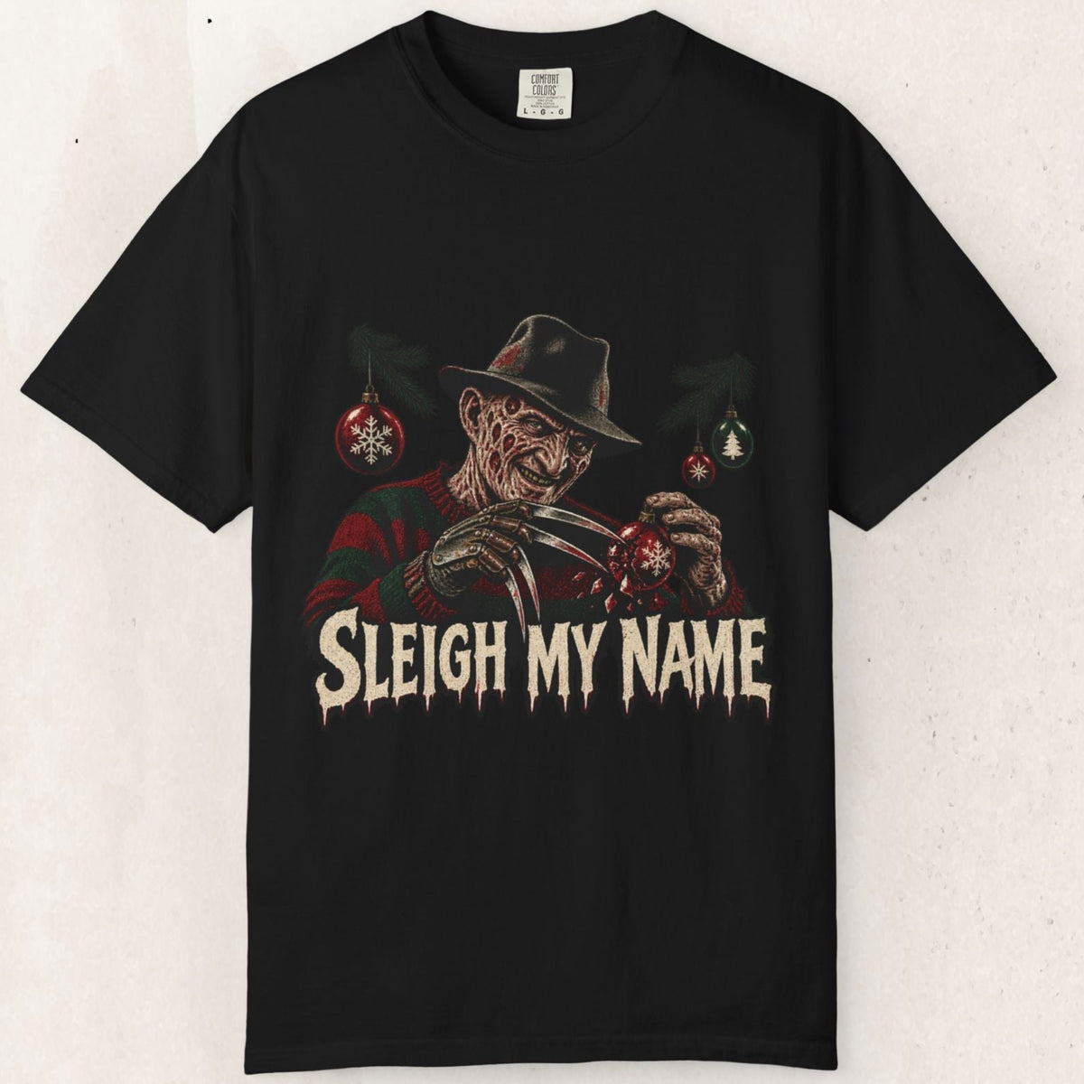 Wicked Thread Society black cotton t-shirt featuring Freddy Krueger with Christmas ornaments and Sleigh My Name text.