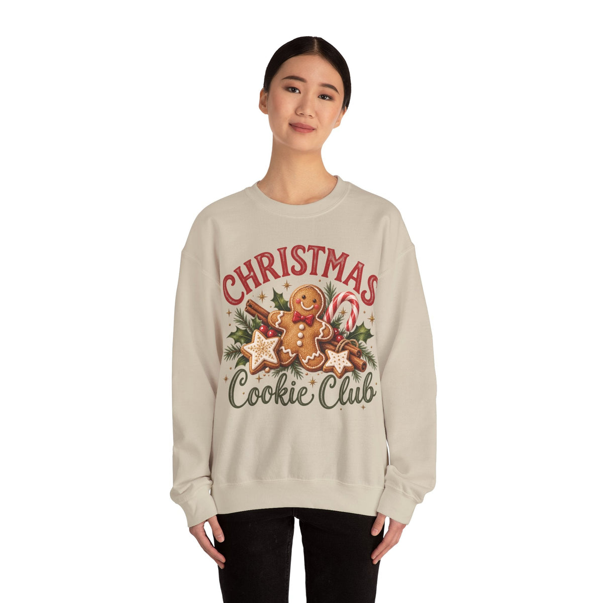 Wicked Thread Society beige crewneck sweatshirt featuring a gingerbread man graphic with holiday greenery and text.