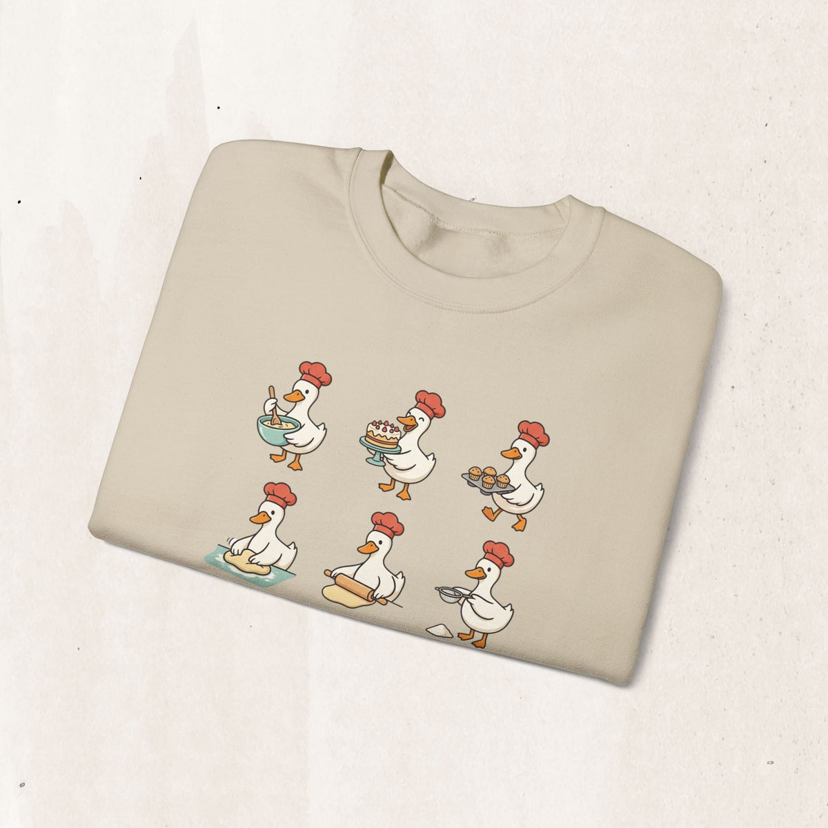 Wicked Thread Society beige crewneck sweatshirt featuring a whimsical print of geese dressed as chefs baking.