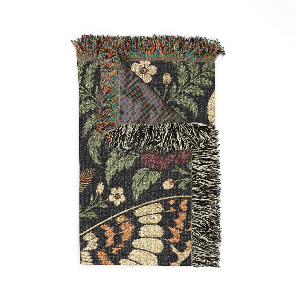Wicked Thread Society gothic floral woven cotton blanket featuring moths, crescent moons, and roses with fringed edges