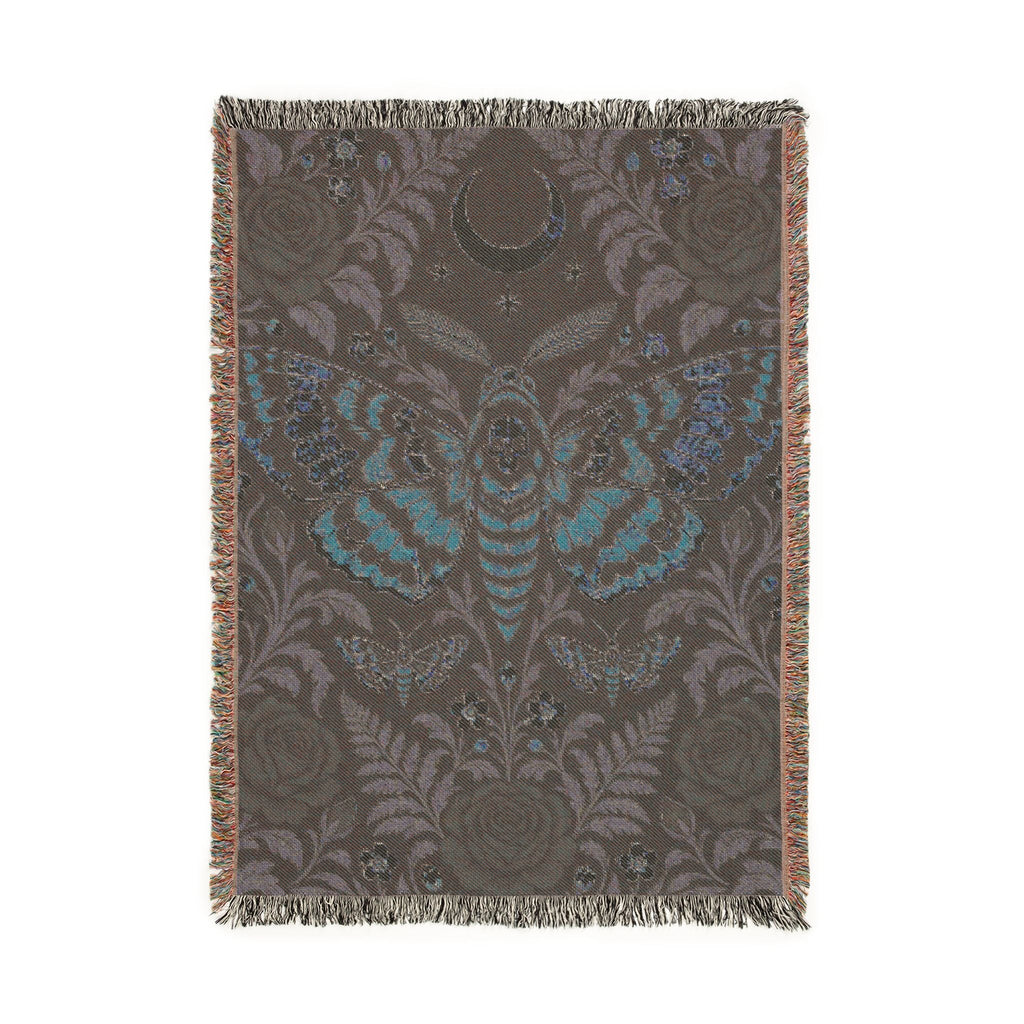 Wicked Thread Society gothic woven cotton blanket featuring a moth, crescent moon, and floral rose pattern with fringe.