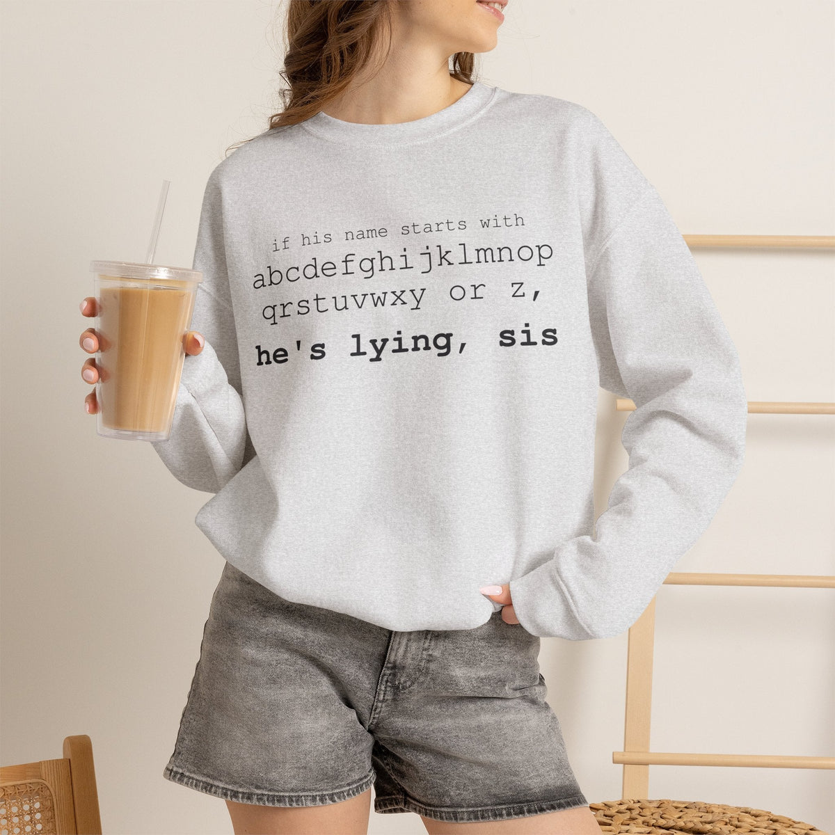 He's Lying, Sis Sweatshirt | Typographic alphabet humor tee Printify