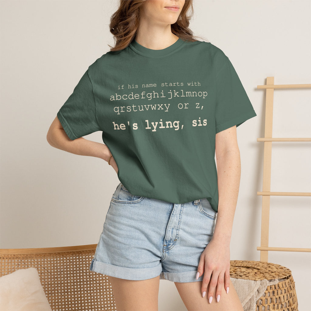 He's Lying, Sis T-shirt | Typographic alphabet humor tee Printify