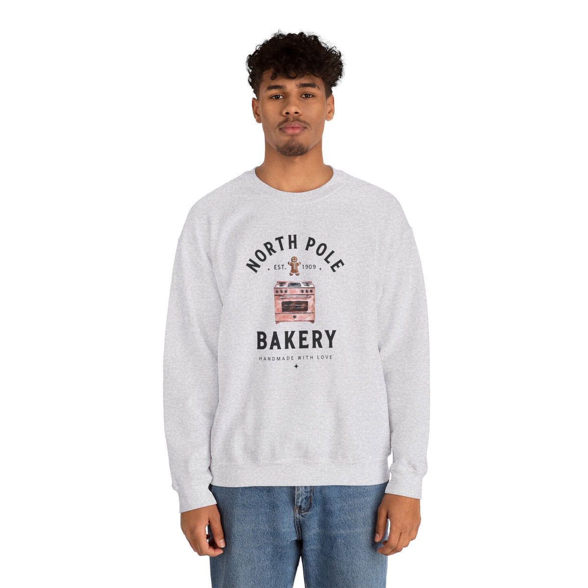 Wicked Thread Society grey crewneck sweatshirt with North Pole Bakery oven and gingerbread man graphic on a man