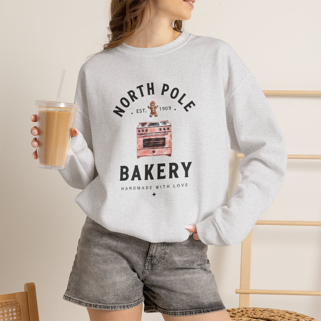 Wicked Thread Society grey crewneck sweatshirt with North Pole Bakery oven and gingerbread man graphic