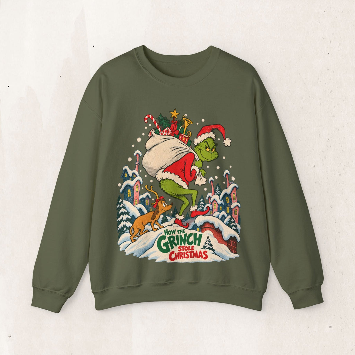 Wicked Thread Society olive green crewneck sweatshirt featuring a vintage Grinch Christmas illustration on the chest.