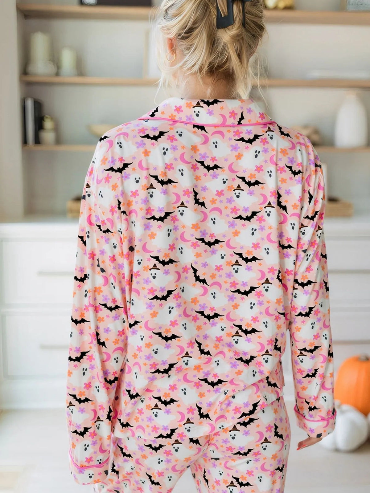 Wicked Thread Society two-piece lounge set with a pink and white Halloween ghost, bat, and flower print button-up top.
