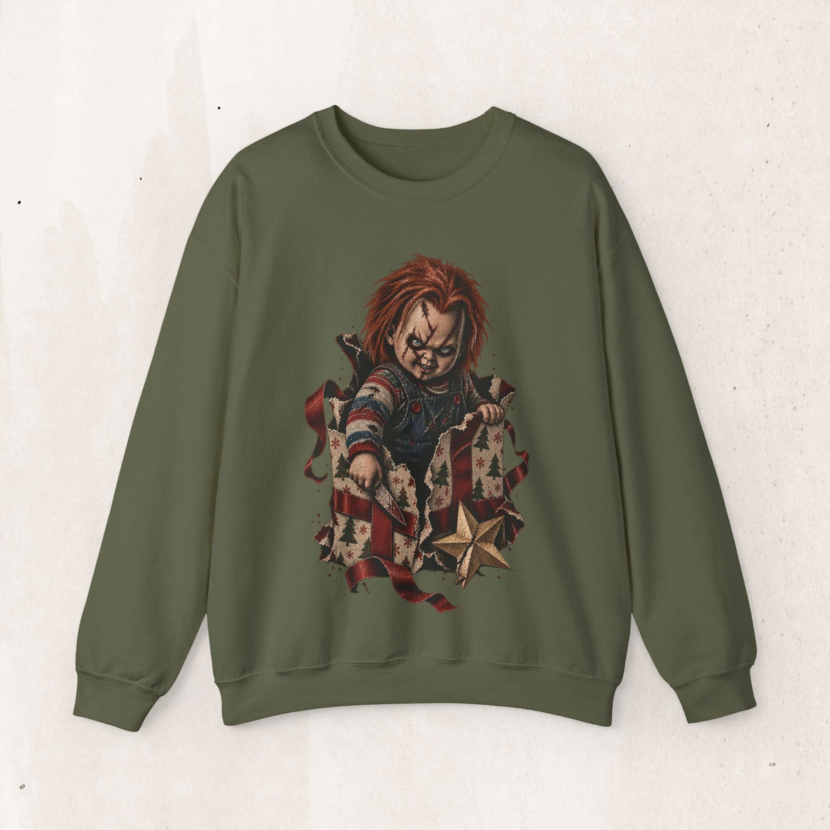 Wicked Thread Society olive green crewneck sweatshirt featuring a horror doll graphic emerging from a gift box