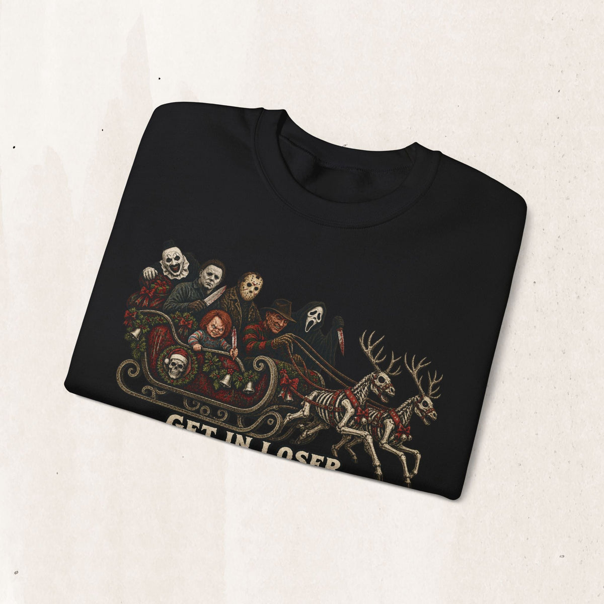 Wicked Thread Society black crewneck sweatshirt featuring a horror movie character sleigh ride graphic print.