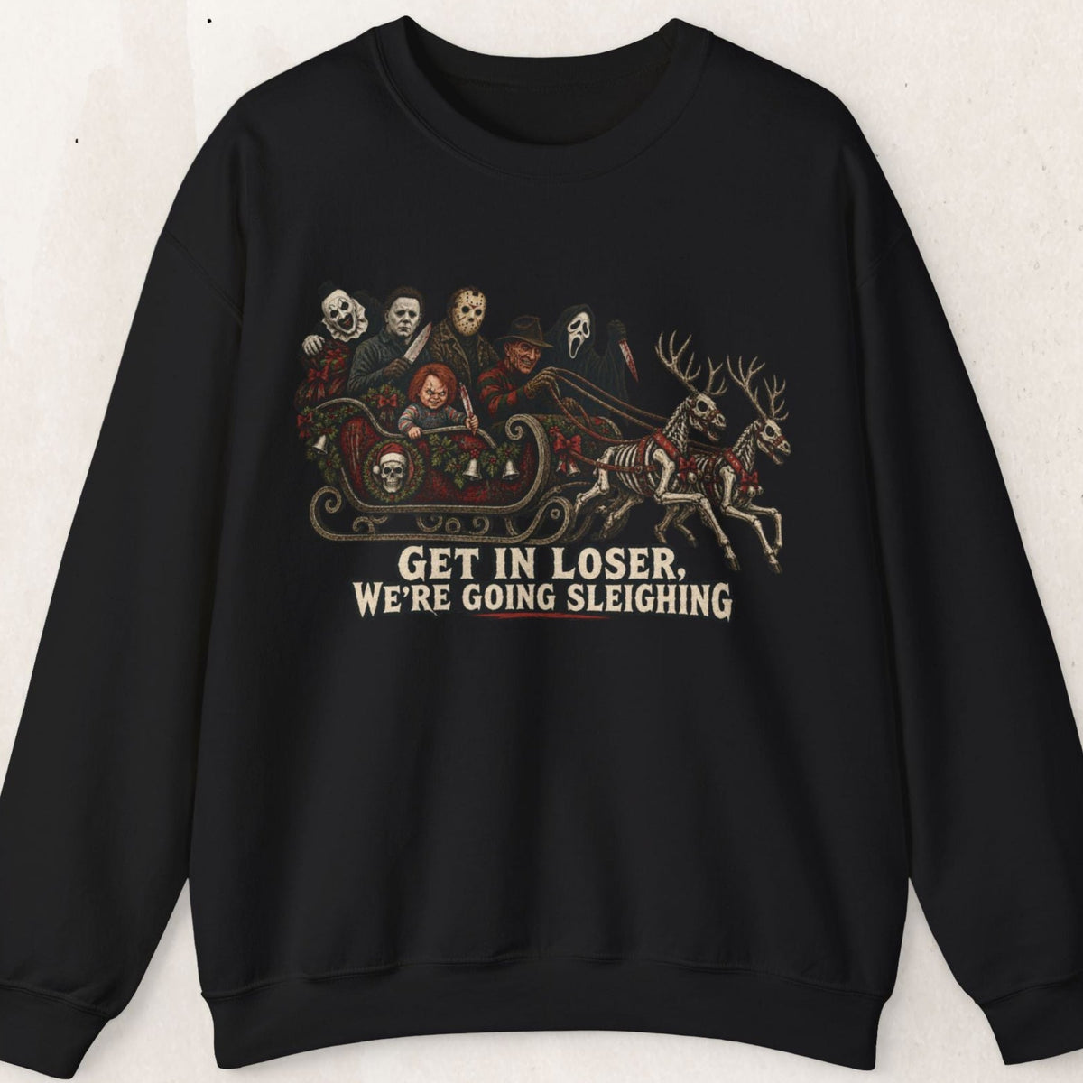 Wicked Thread Society black crewneck sweatshirt featuring a horror movie character sleigh ride graphic print