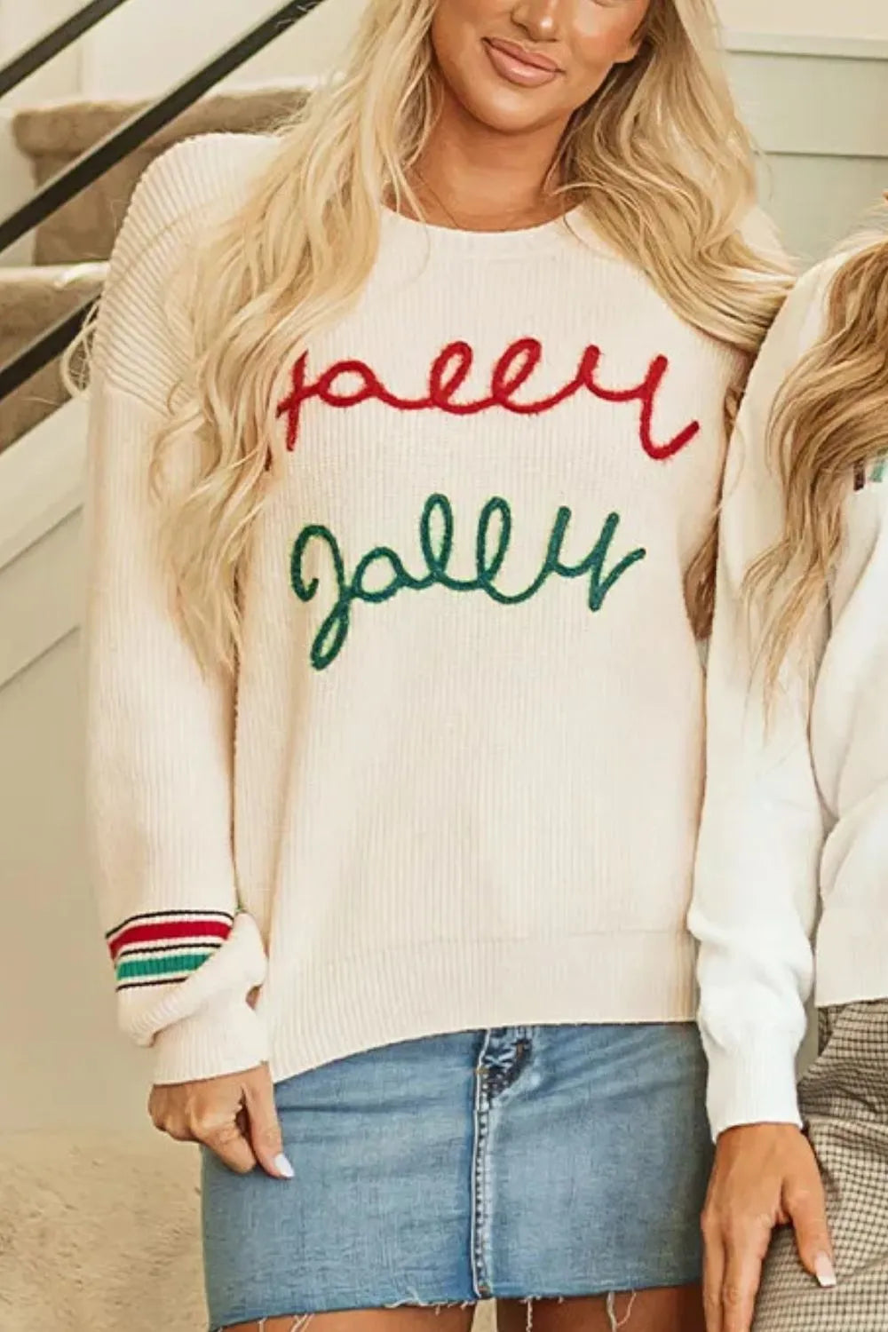 Wicked Thread Society cream long sleeve sweater with red and green Jolly embroidery and striped cuffs