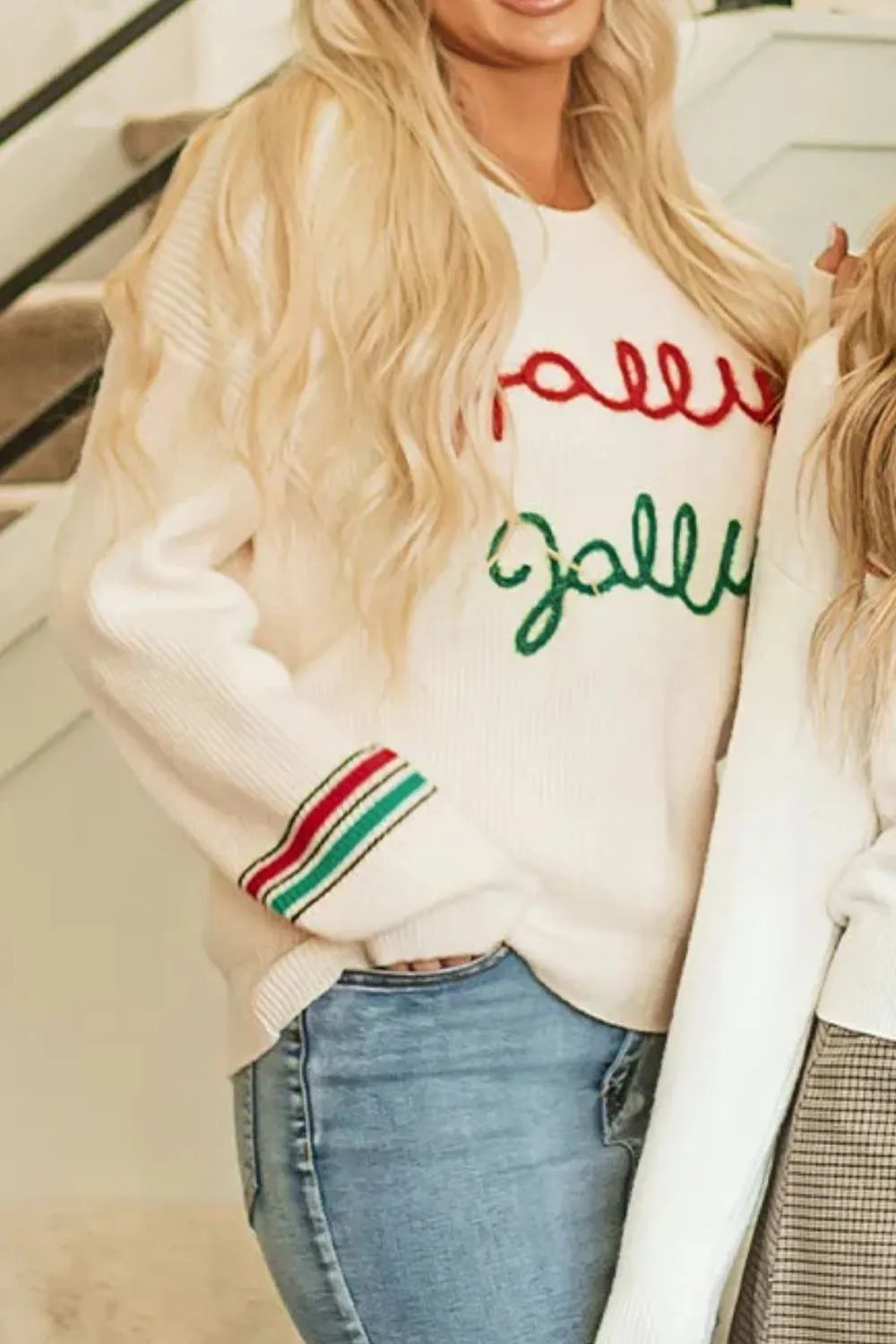 Wicked Thread Society cream long sleeve sweater with red and green Jolly lettering and striped cuffs