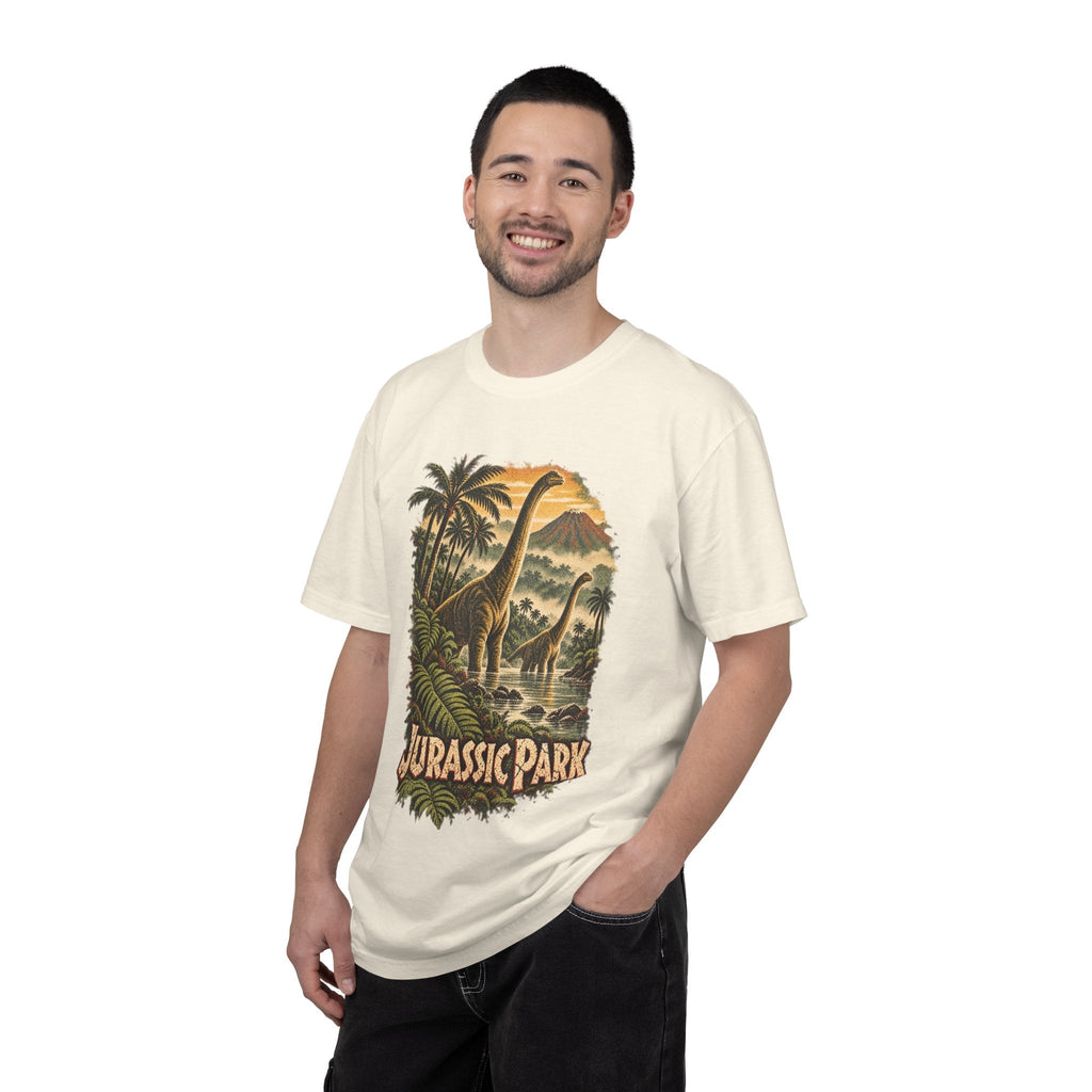 Man wearing a Wicked Thread Society cream heavyweight cotton t-shirt with a vintage Jurassic Park dinosaur graphic.