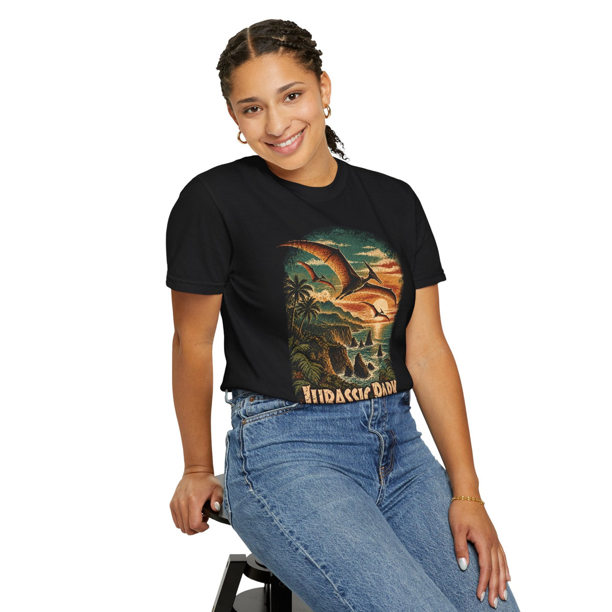 Wicked Thread Society black Jurassic Park graphic t-shirt with a retro sunset and pterodactyl print on a smiling model