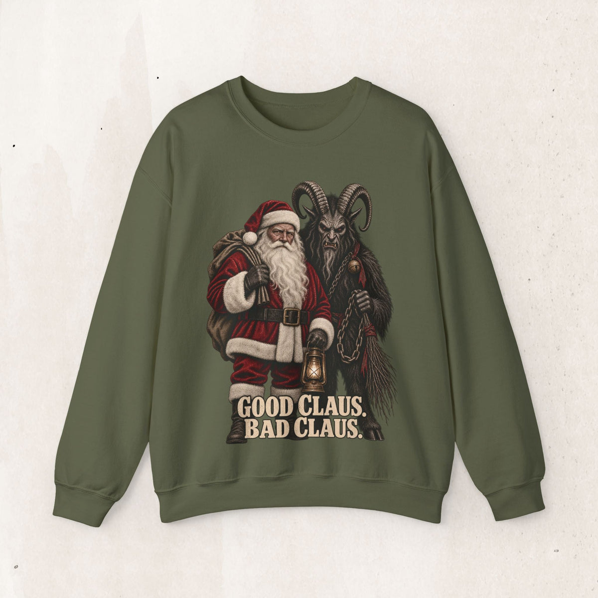 Wicked Thread Society olive green crewneck sweater featuring a graphic of Santa Claus and Krampus with text.