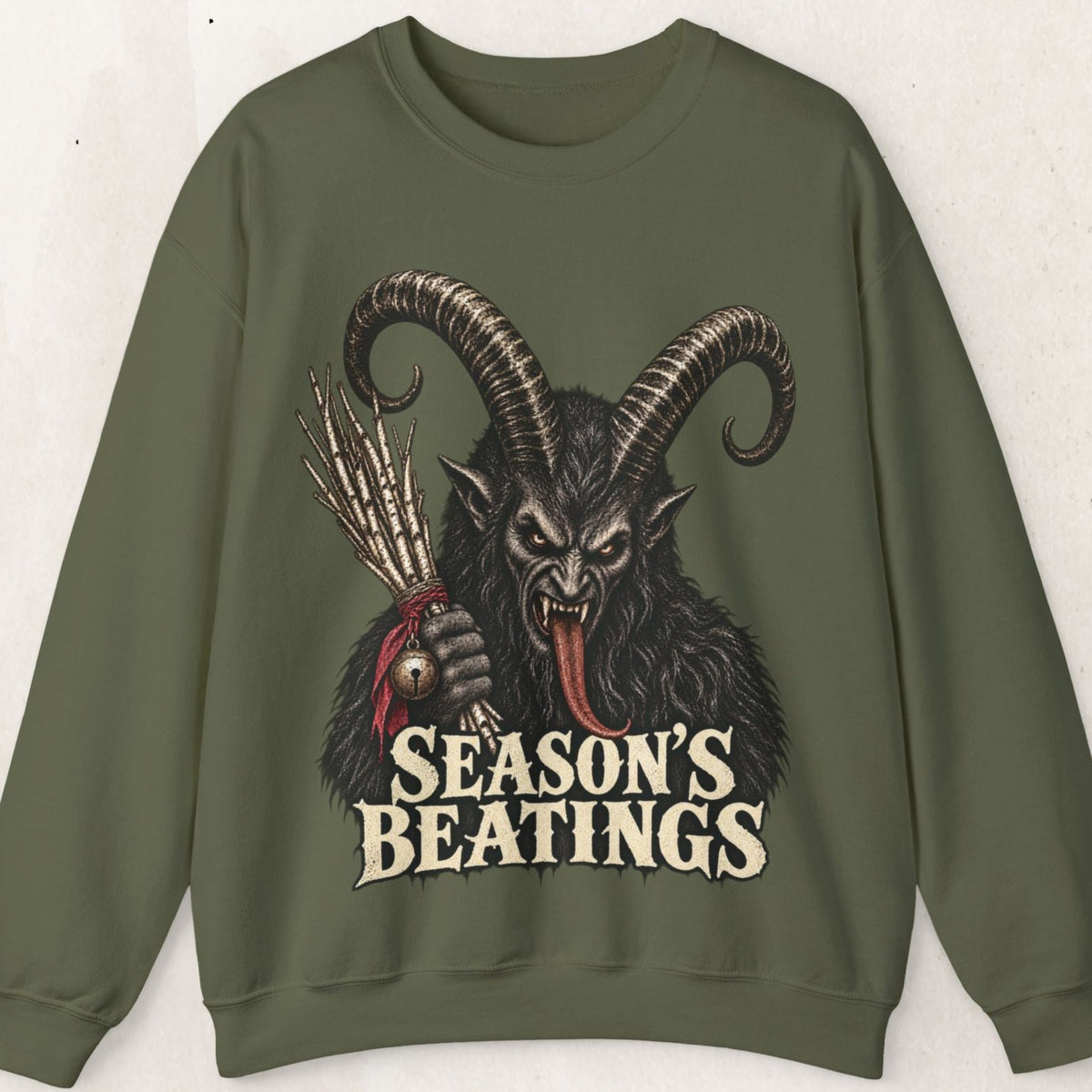 Wicked Thread Society olive green crewneck sweatshirt featuring a detailed Krampus illustration and Seasons Beatings text