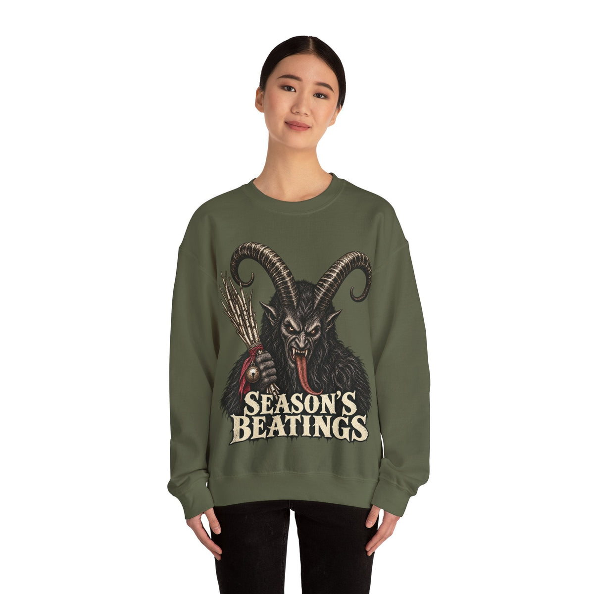 Wicked Thread Society olive green crewneck sweatshirt featuring a Krampus illustration and Season's Beatings text.