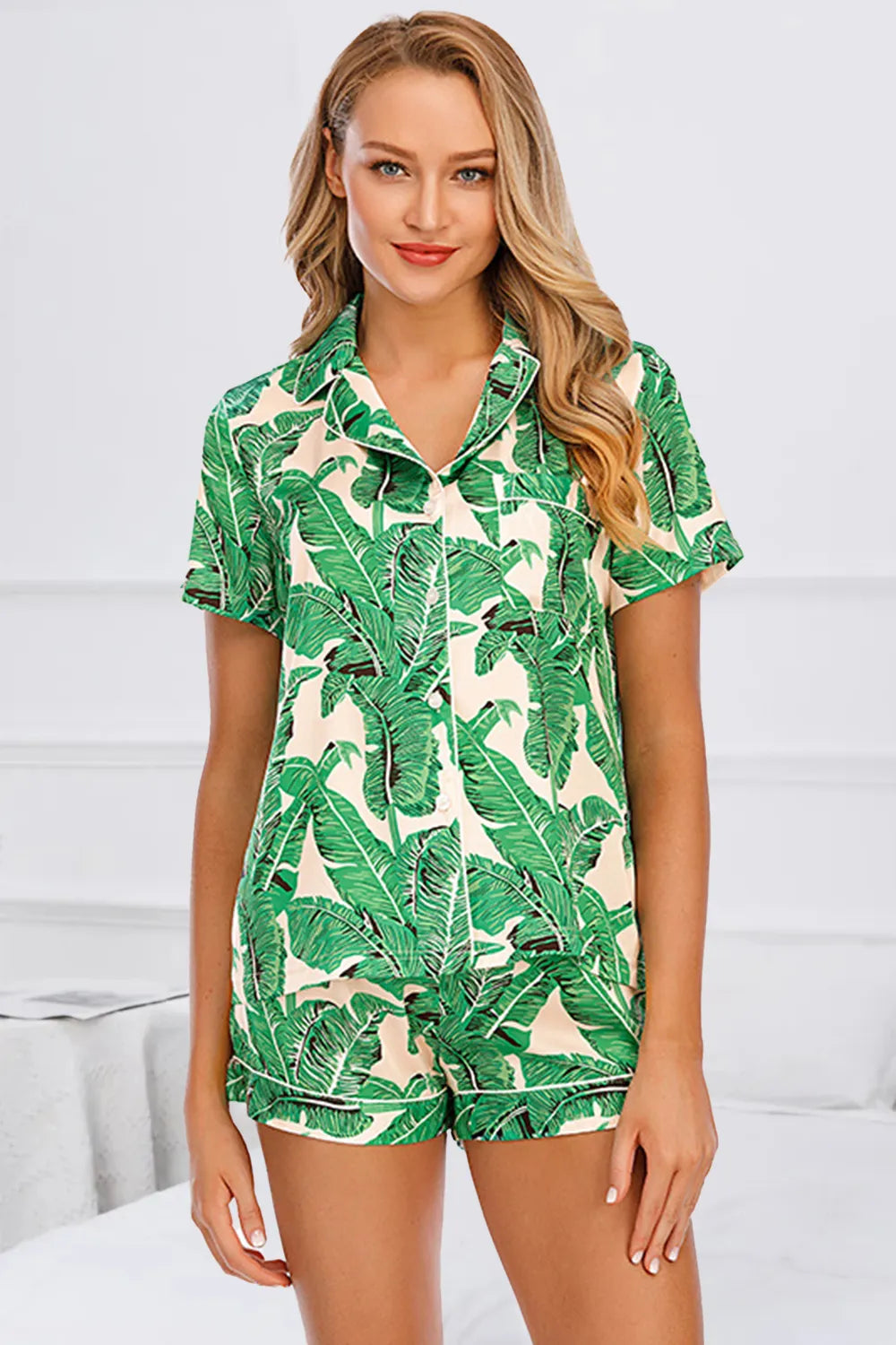 Wicked Thread Society two-piece lounge set with a green tropical leaf print, button-up shirt, and matching shorts.