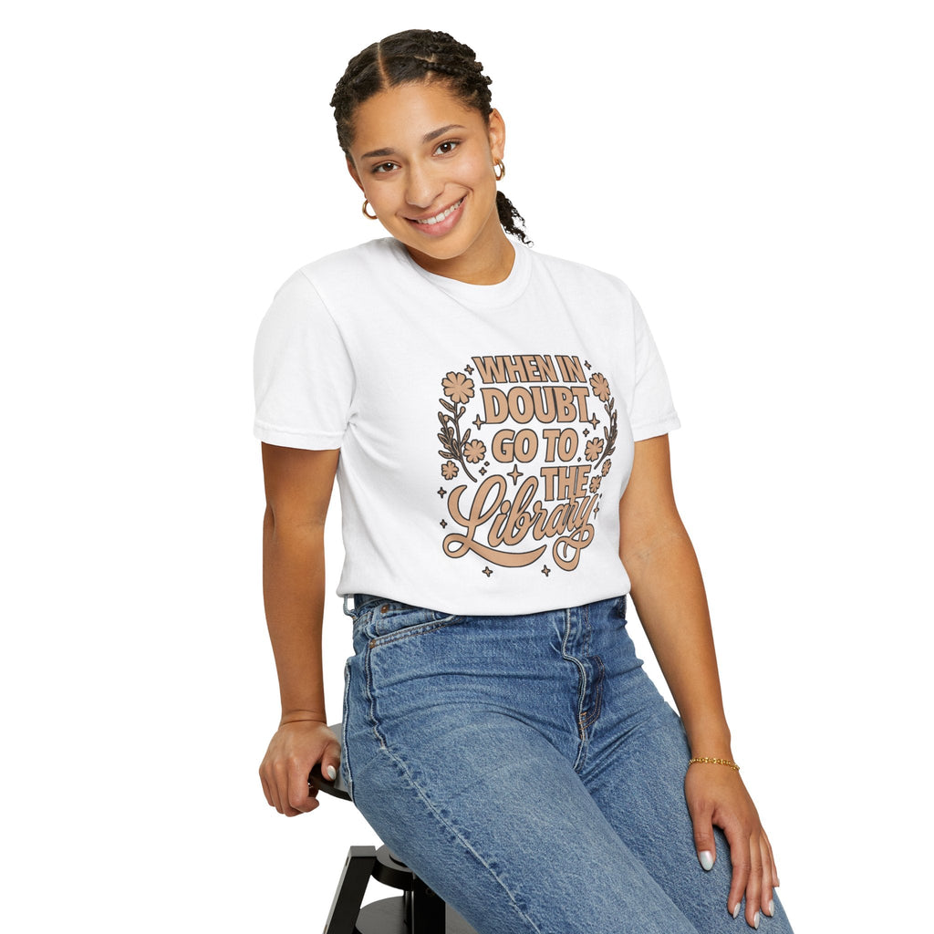 Wicked Thread Society white graphic tee with When in Doubt Go to the Library text and floral design on a woman