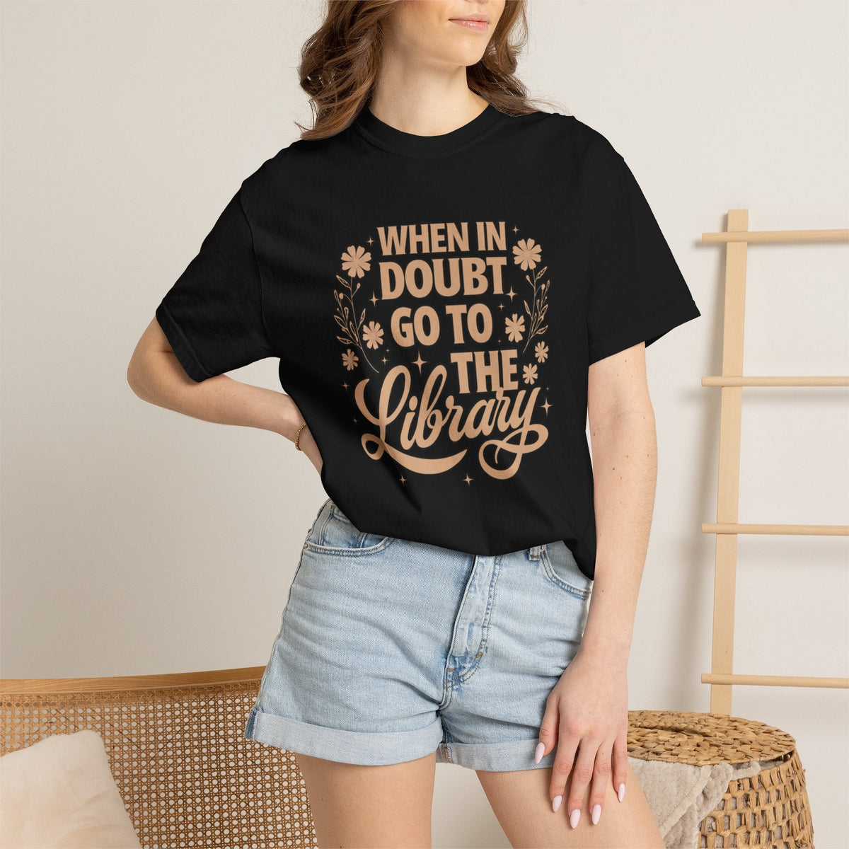 Wicked Thread Society black cotton graphic tee featuring When in Doubt Go to the Library text with floral accents