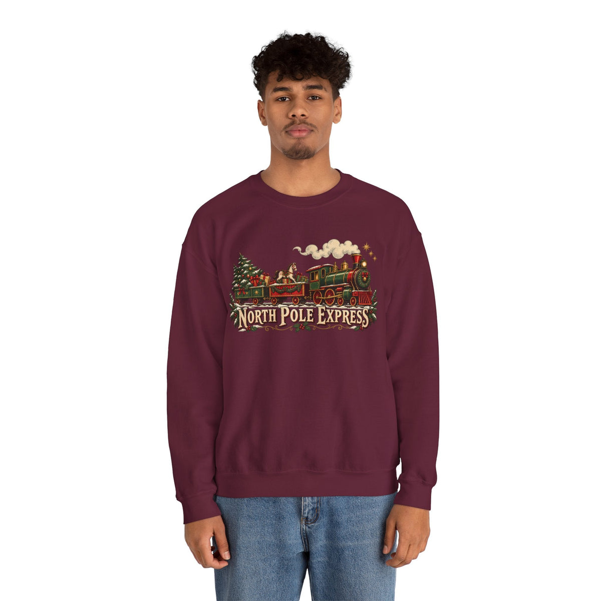 A man wearing a Wicked Thread Society burgundy crewneck sweatshirt with a vintage North Pole Express train graphic.