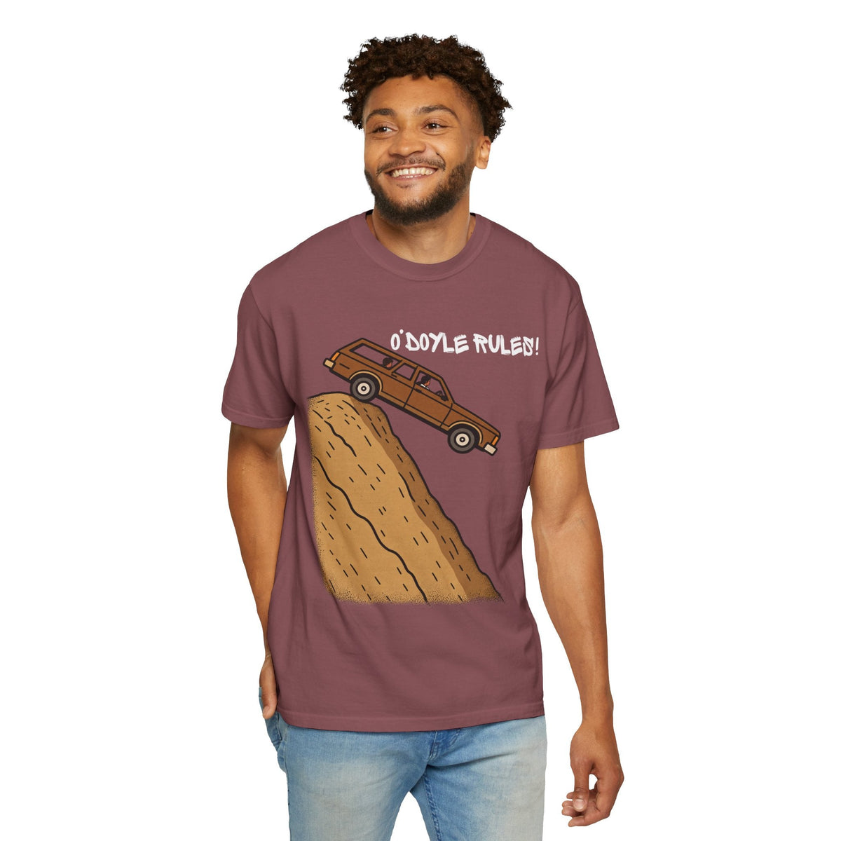 A man wearing a Wicked Thread Society garment-dyed maroon heavyweight cotton tee with an O'Doyle Rules graphic print.