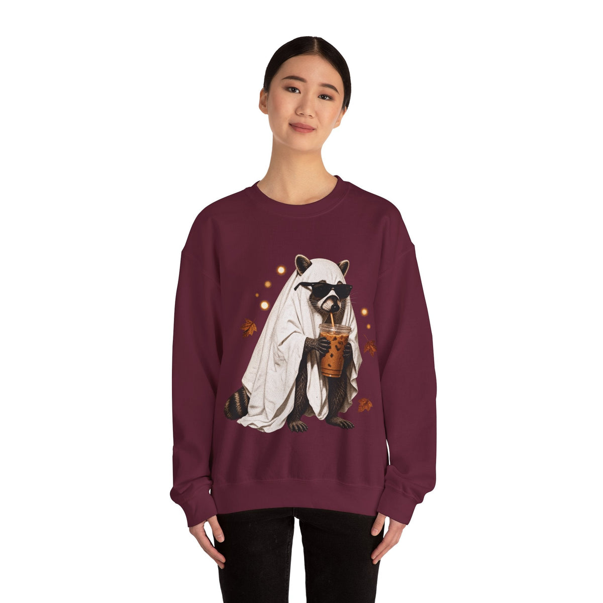Wicked Thread Society maroon crewneck sweatshirt featuring a raccoon in a ghost costume drinking boba tea.