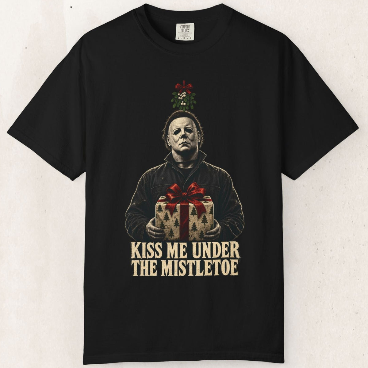 Wicked Thread Society black heavyweight cotton t-shirt featuring Michael Myers holding a gift under mistletoe.