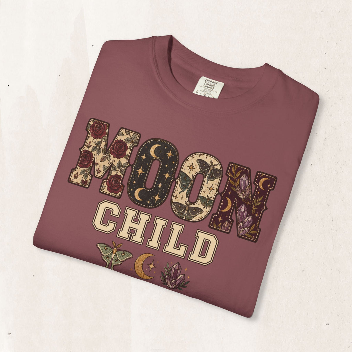 Wicked Thread Society garment-dyed heavyweight cotton tee in dusty rose with Moon Child floral and celestial graphic