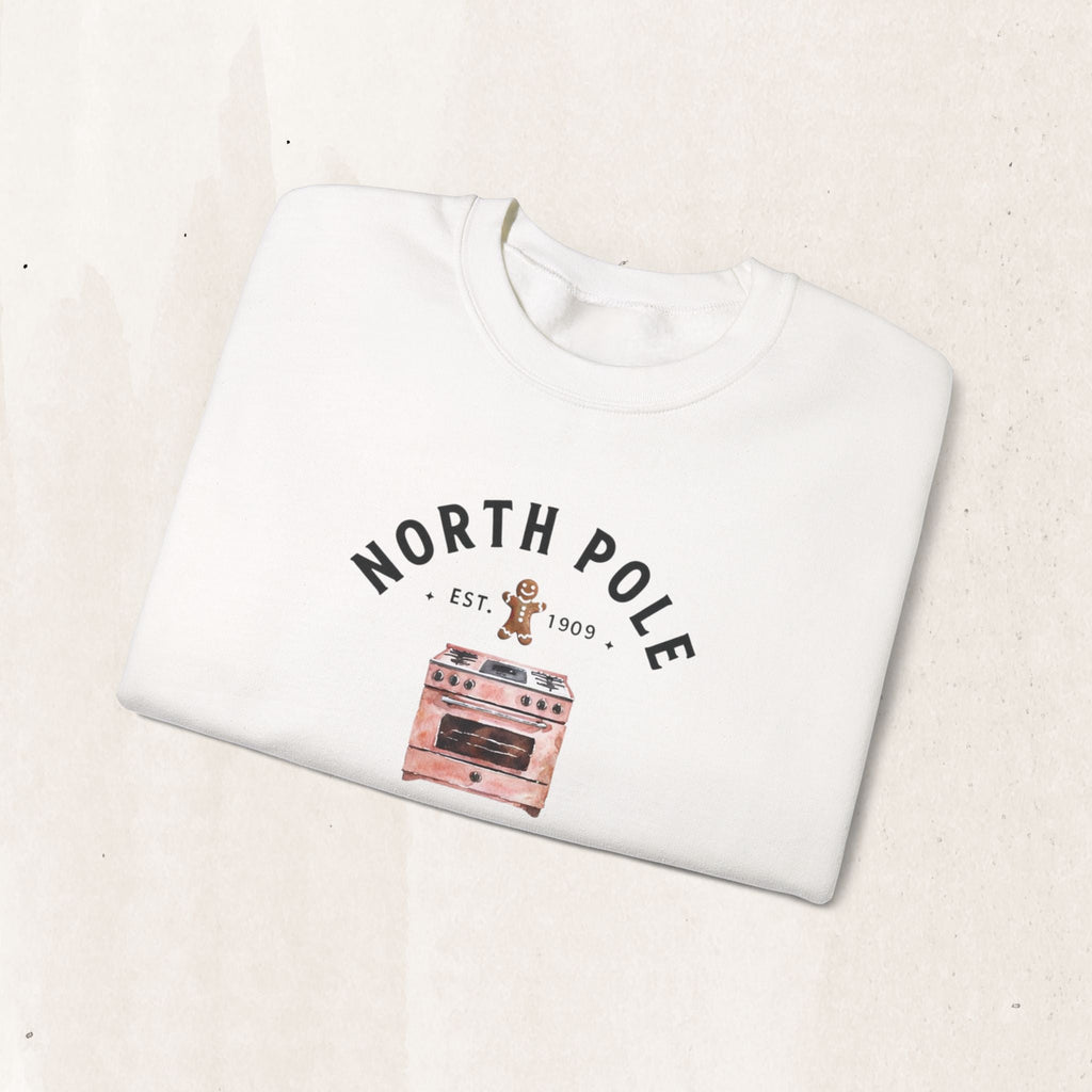 Wicked Thread Society white crewneck sweatshirt featuring a vintage North Pole Bakery oven and gingerbread man graphic