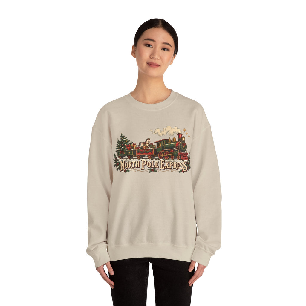 Wicked Thread Society beige crewneck sweatshirt featuring a vintage North Pole Express steam train Christmas graphic