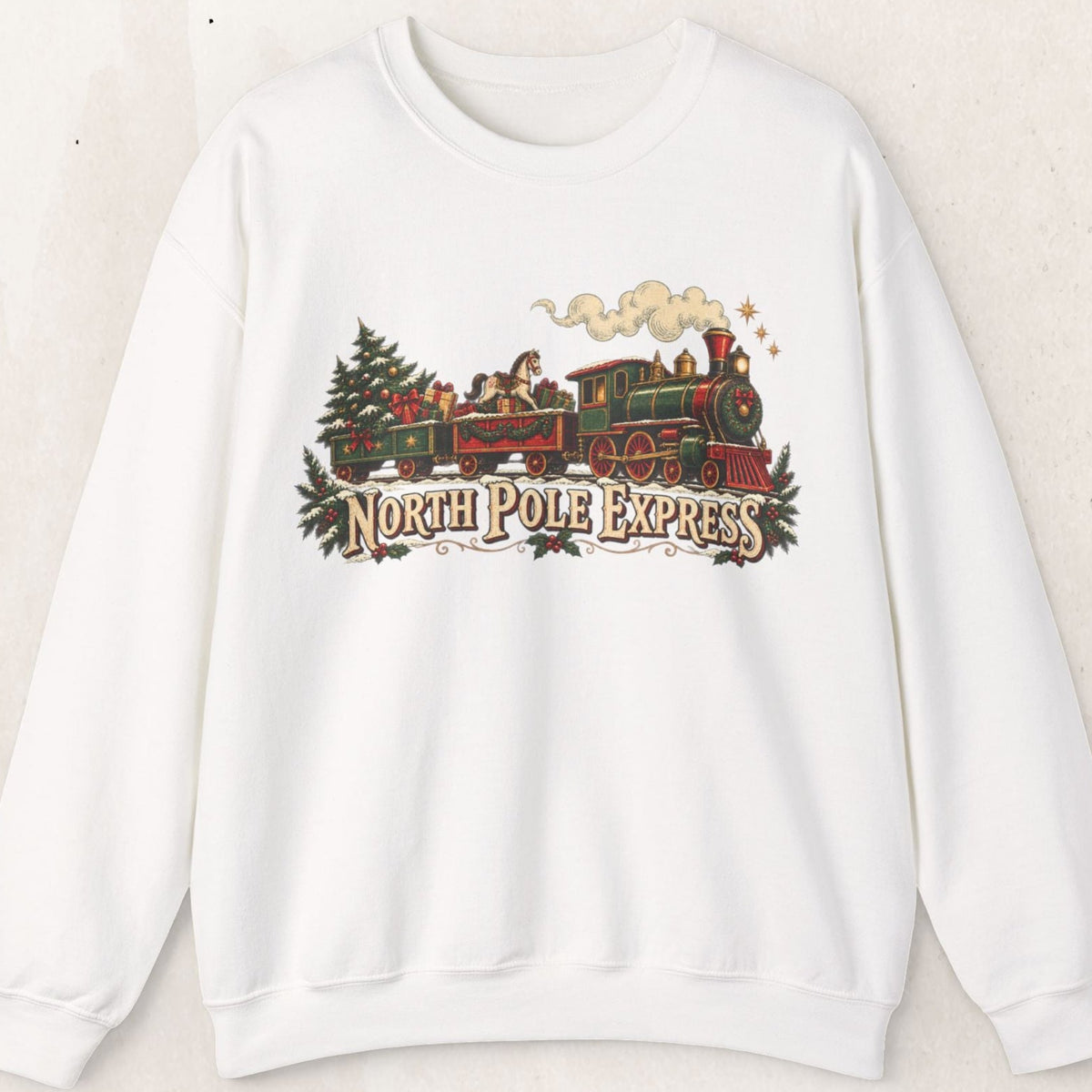 Wicked Thread Society white crewneck sweatshirt featuring a vintage North Pole Express steam train holiday graphic.