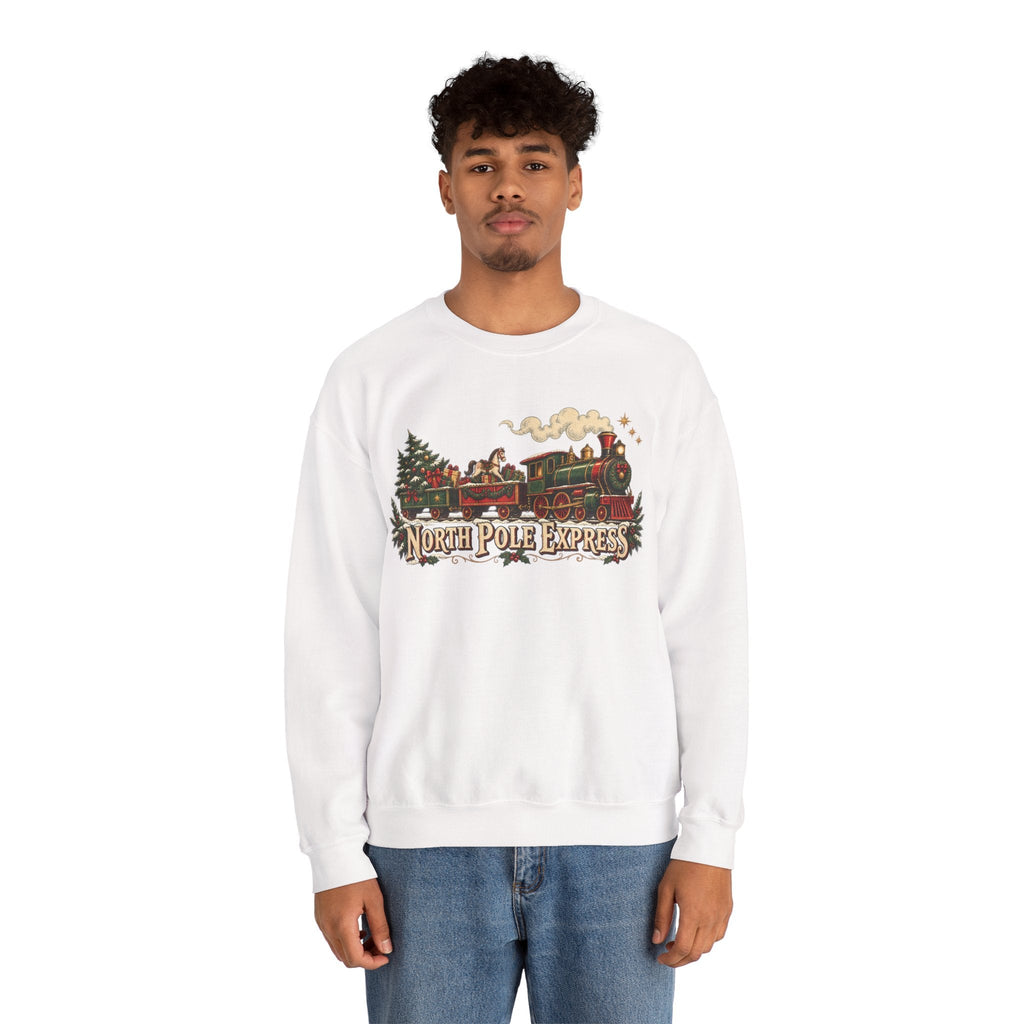 A man wearing a white Wicked Thread Society crewneck sweatshirt featuring a vintage North Pole Express train graphic.