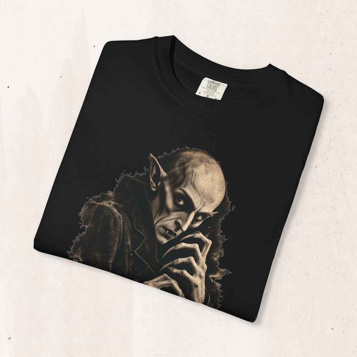 Wicked Thread Society black t-shirt featuring a sepia-toned graphic portrait of Count Orlok from Nosferatu.