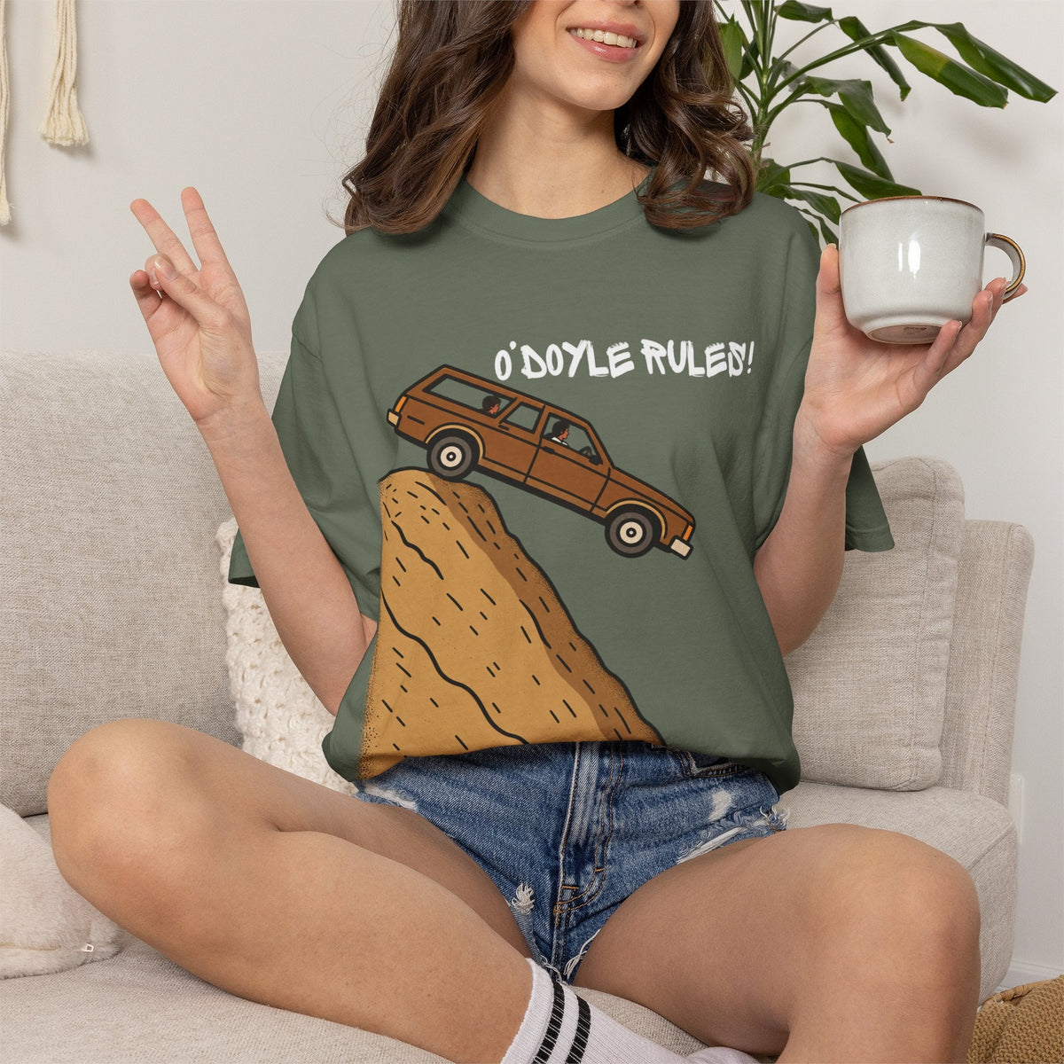 Wicked Thread Society olive green relaxed-fit cotton tee featuring a vintage wood-paneled wagon O'Doyle Rules graphic.