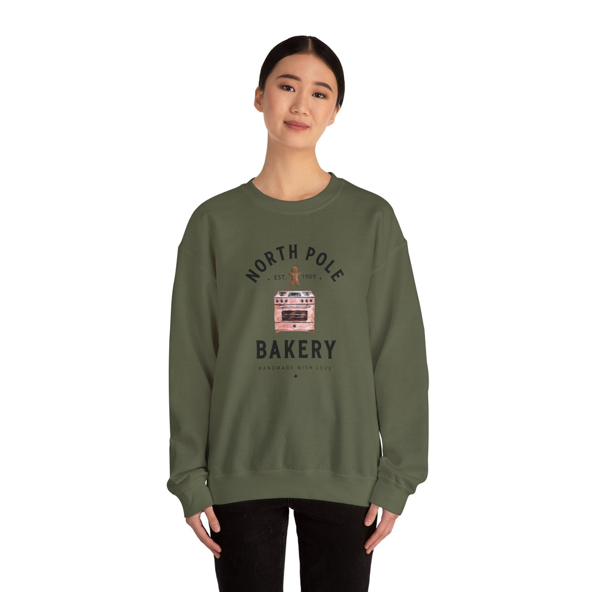 Wicked Thread Society olive green crewneck sweatshirt featuring a vintage North Pole Bakery oven and gingerbread man