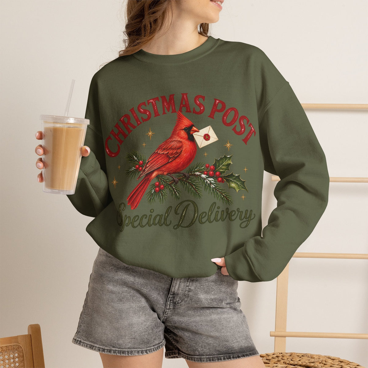 Wicked Thread Society olive green crewneck sweatshirt featuring a cardinal bird illustration and Christmas text.