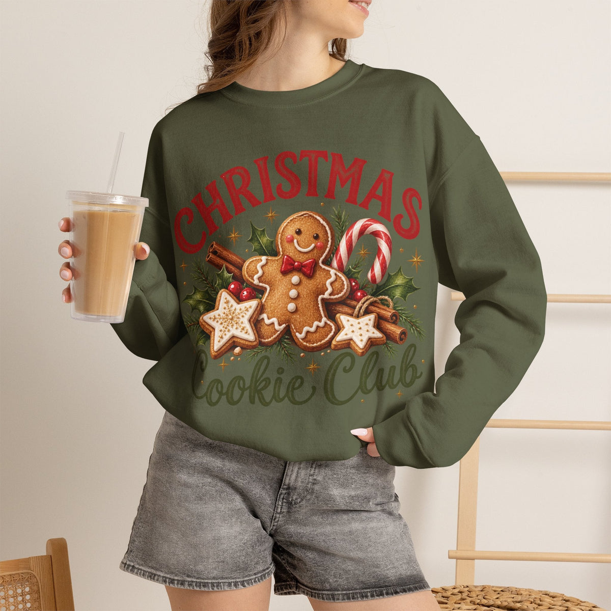 Wicked Thread Society olive green crewneck sweatshirt with a gingerbread man and Christmas cookie graphic