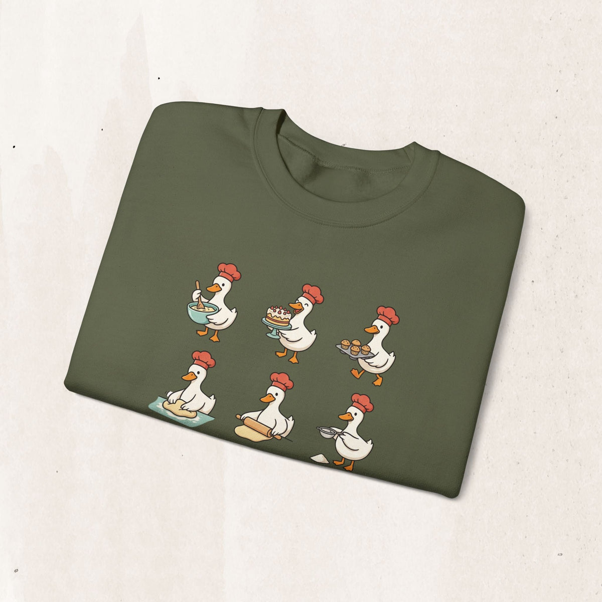 Wicked Thread Society olive green crewneck sweatshirt featuring a whimsical print of geese baking in chef hats.