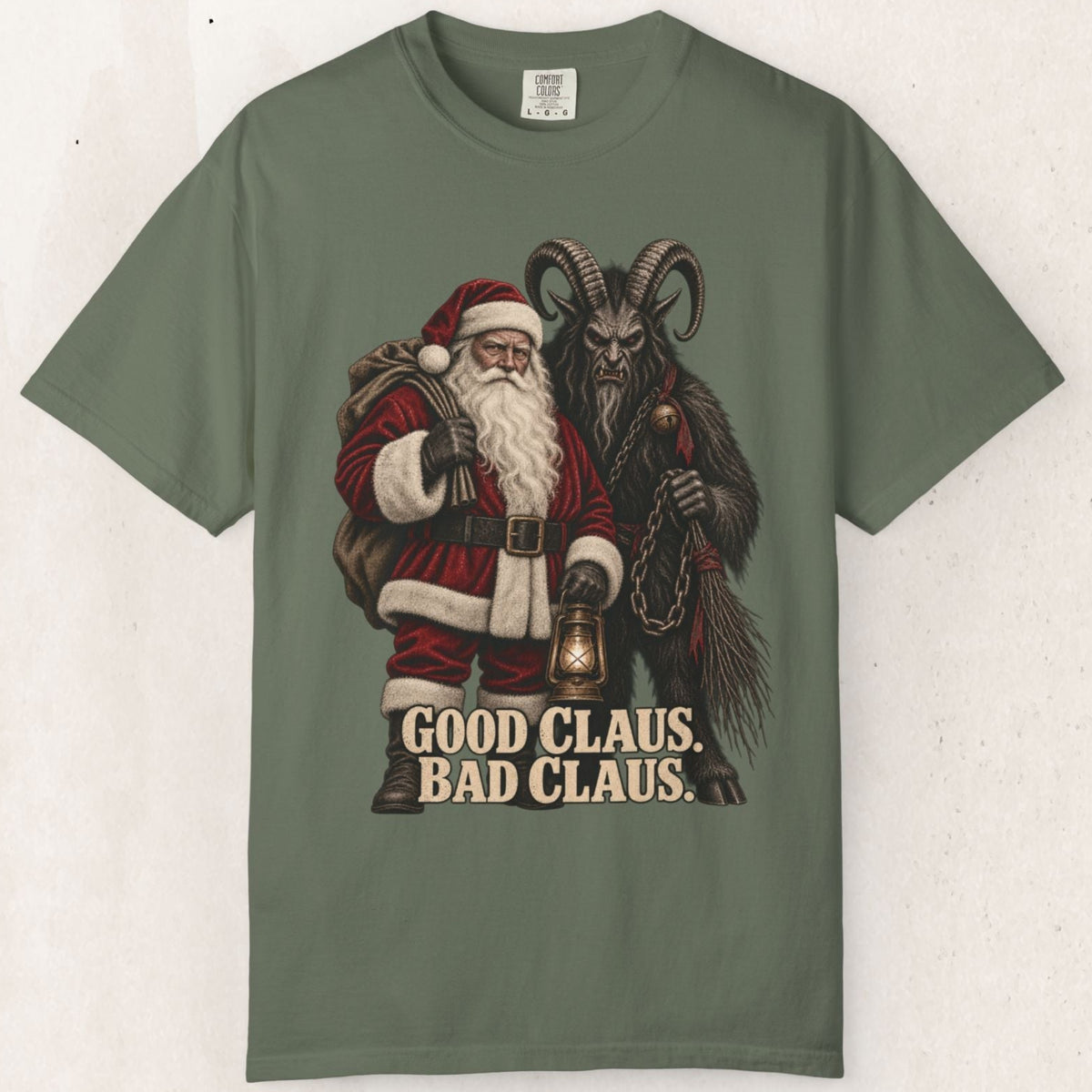 Wicked Thread Society olive green heavyweight cotton t-shirt featuring a Santa and Krampus graphic print.