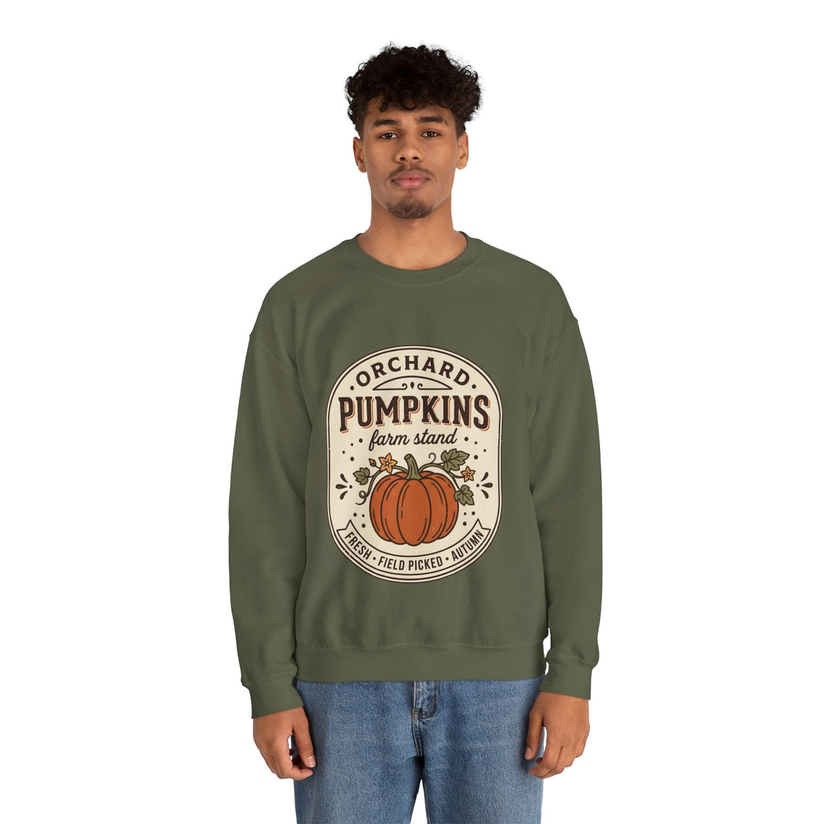 Wicked Thread Society olive green crewneck sweatshirt with a vintage pumpkin farmstand graphic on a male model.