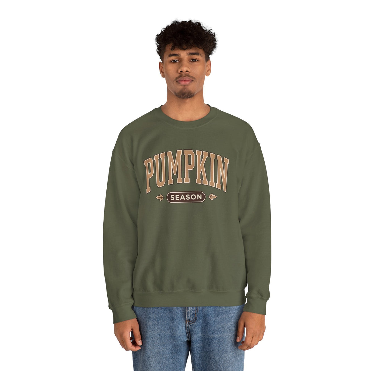 A model wearing a Wicked Thread Society olive green crewneck sweatshirt with a vintage Pumpkin Season graphic print.