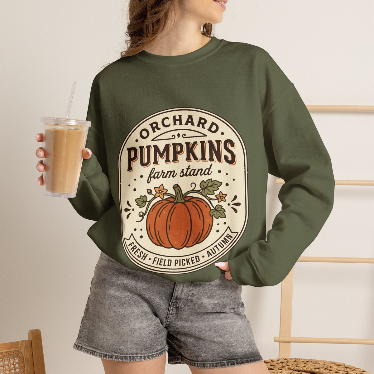 Wicked Thread Society olive green crewneck sweatshirt with a vintage pumpkin farmstand graphic print
