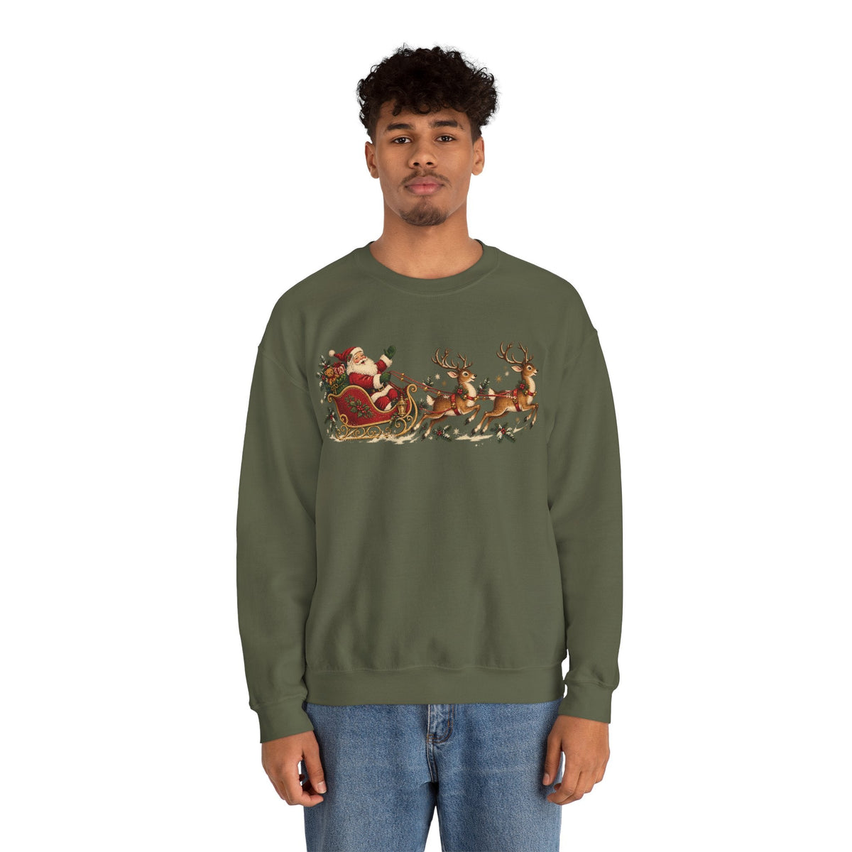 A man wearing a Wicked Thread Society olive green crewneck sweatshirt with a vintage Santa sleigh print.