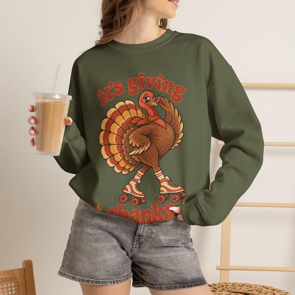 Wicked Thread Society olive green crewneck sweatshirt featuring a retro roller-skating turkey graphic for Thanksgiving.