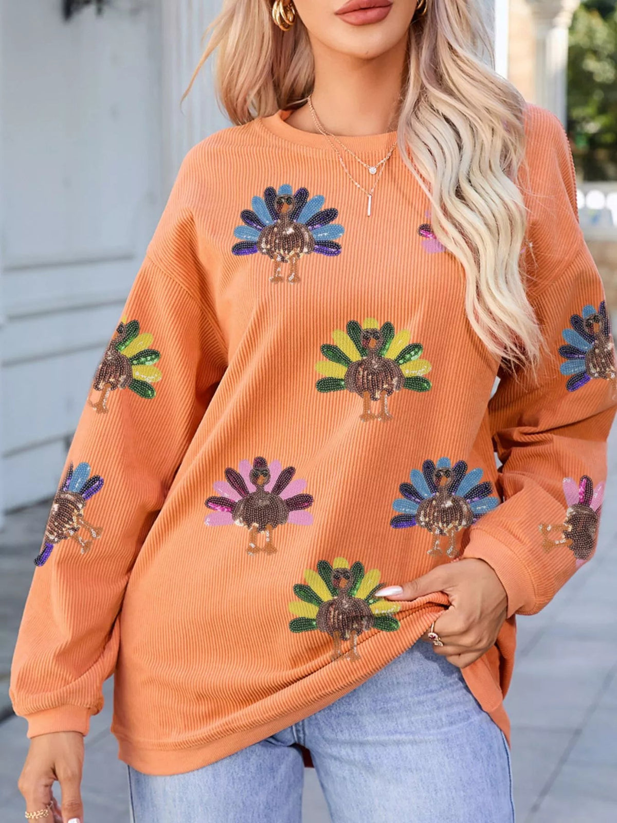 Wicked Thread Society orange corded crewneck sweater featuring a playful turkey graphic with colorful sequins