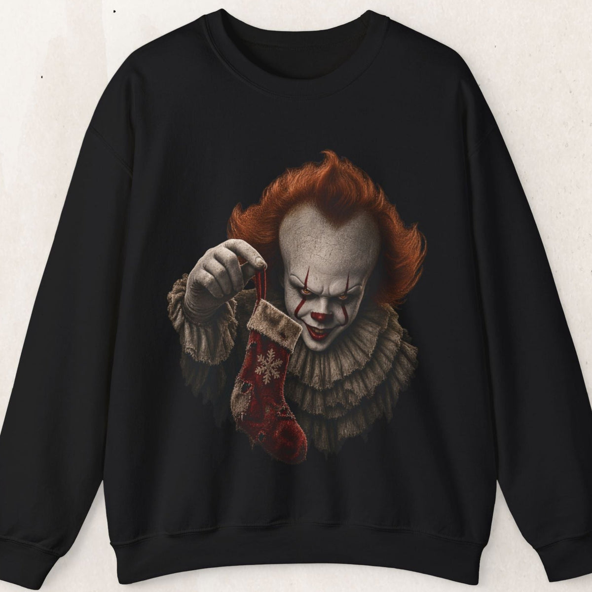 Wicked Thread Society black crewneck sweatshirt featuring a detailed graphic of Pennywise holding a Christmas stocking
