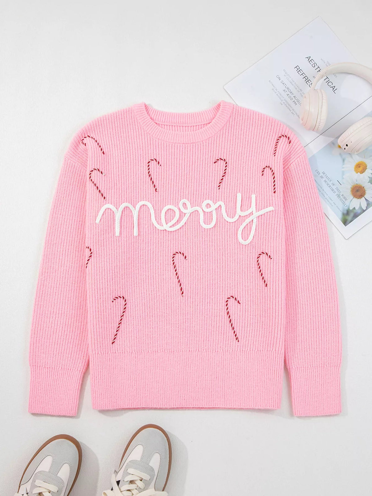 Wicked Thread Society pink knit sweater with embroidered candy canes and the word merry in white script