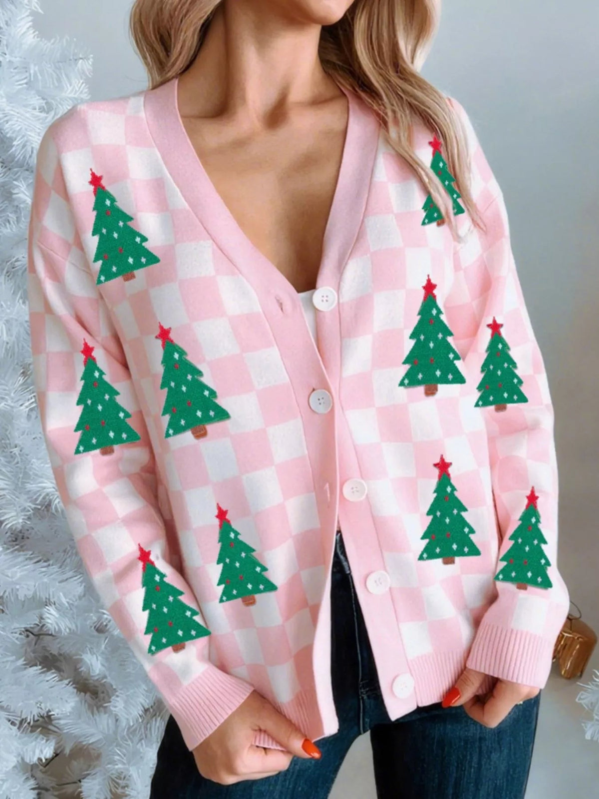 Wicked Thread Society pink and white checkered V-neck cardigan with green Christmas tree patterns and button front.